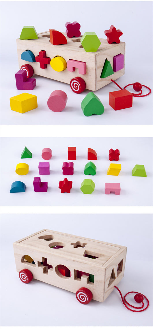 Happy baby playing with a wooden shape matching building block toy, featuring a natural wood box and colorful geometric shapes. - Image 6