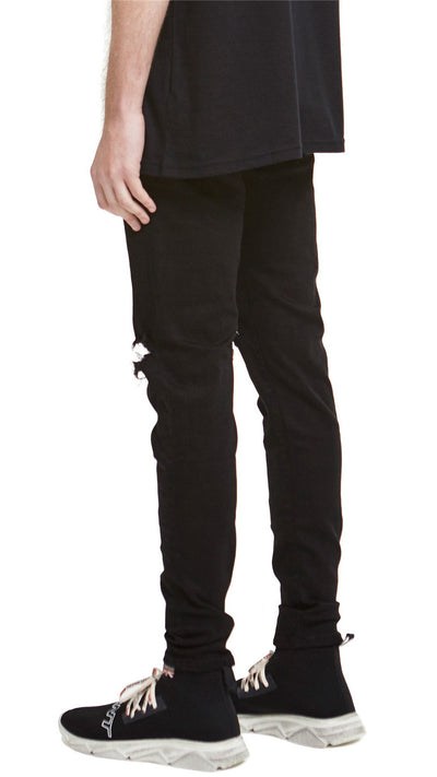 Jeans Slim Fit Azul con Corte en Rodilla y Diseño Spray Pintado - Image 10