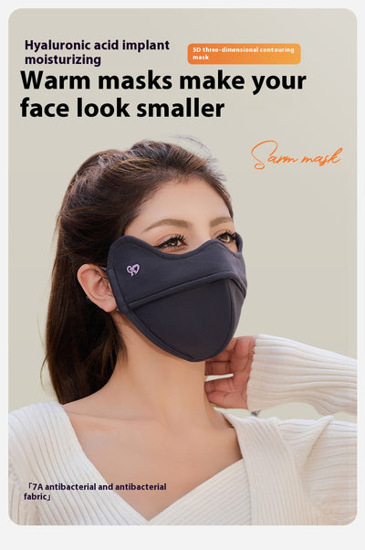 Woman wearing a grey outdoor cycling wind mask with ear hooks and a small heart logo, designed for cold-proof eye protection. - Image 24