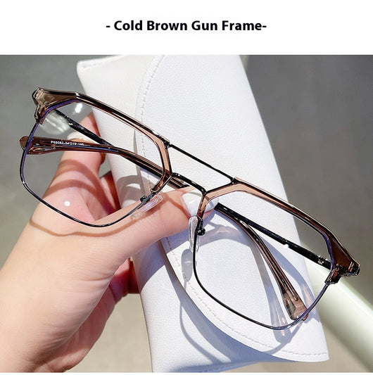 Anti-blue light glasses with a sand black and silver double beam frame, held against a white case. - Image 23