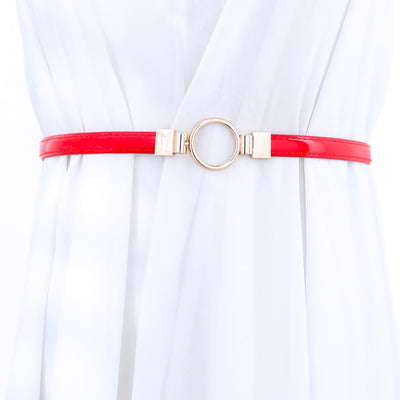Black imitation leather belt with a glossy finish and a gold-tone round double buckle. - Image 8