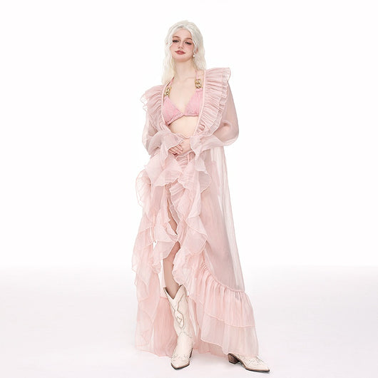 Light pink ruffled sheer swimsuit cover-up blouse over a matching bikini, perfect for beach vacations. - Image 2