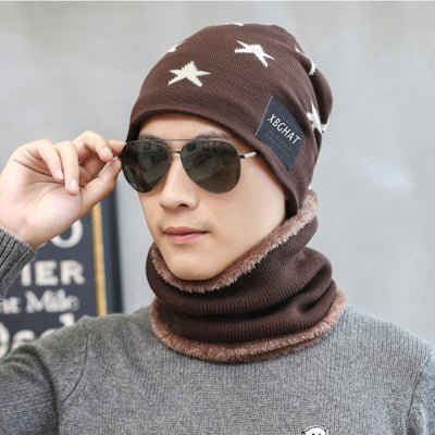 Brown knitted beanie with white five-pointed stars and a matching fleece-lined neck warmer on a man. - Image 2