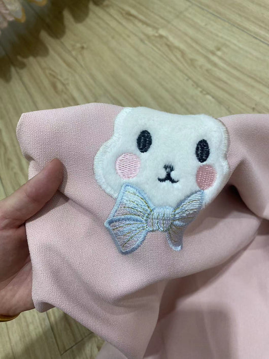 Pink curtains with white plush rabbit appliques, paired with a sheer white inner curtain also featuring rabbit designs. - Image 9