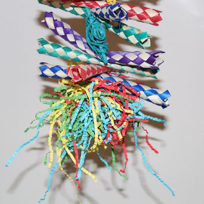 Colorful bird gnawing toy with braided paper strips, shredded paper, and woven balls, hanging from a hook. - Image 7