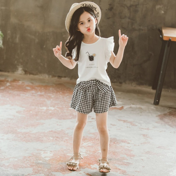 Conjunto Infantil Niña Estilo Coreano: Blusa Manga Corta y Short a Cuadros con Moño - Image 8