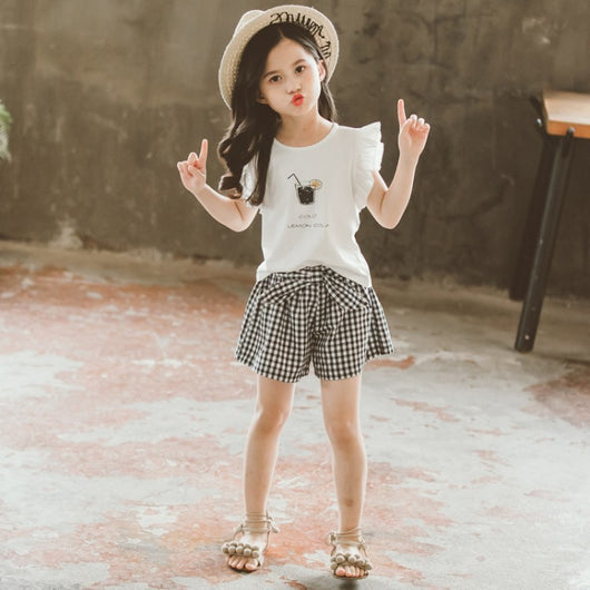 Conjunto Infantil Niña Estilo Coreano: Blusa Manga Corta y Short a Cuadros con Moño - Image 8