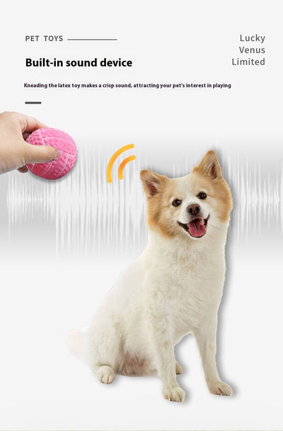 Pink latex pet toy shaped like a mini volleyball with white seams and a textured surface. - Image 12