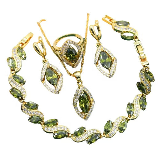 Gold-toned jewelry set with green marquise gemstones and clear accents, including a bracelet, necklace, earrings, and ring. - Image 5