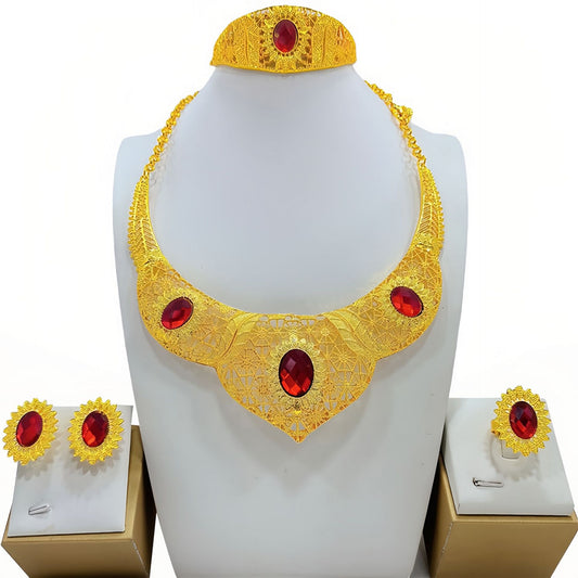 Golden jewelry set with a wide necklace, cuff bracelet, stud earrings, and ring, all featuring blue oval gemstones and intricate filigree patterns. - Image 2