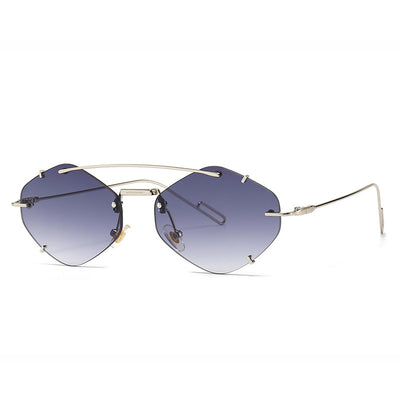 Metal frameless sunglasses for women with geometric gradient gray lenses and a silver-colored frame. - Image 11
