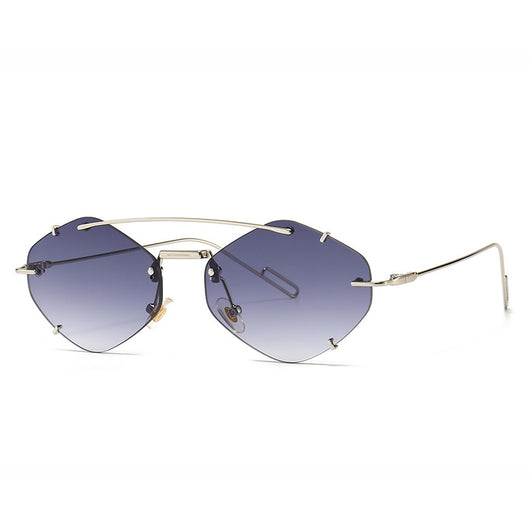 Metal frameless sunglasses for women with geometric gradient gray lenses and a silver-colored frame. - Image 11