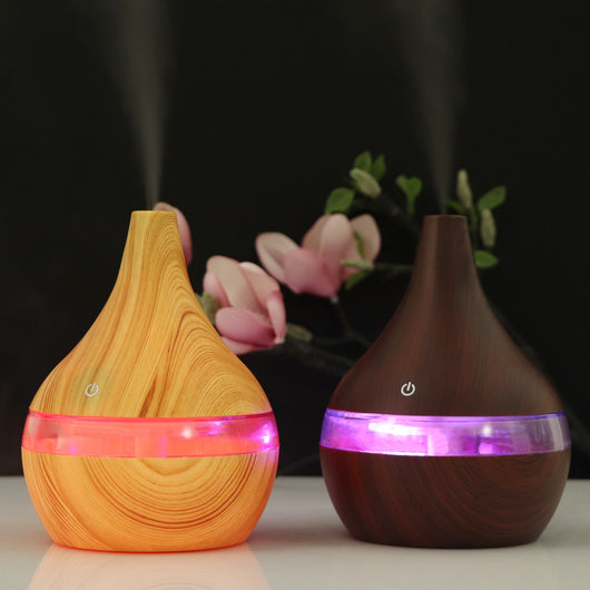 Dark wood grain USB mini tip air purifier and humidifier with a teardrop shape and a silver band. - Image 18