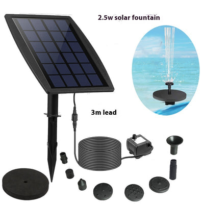 5W solar fountain kit with black solar panel on a ground stake, water pump, coiled hose, and various nozzles. - Image 18