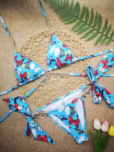 Turquoise triangle bikini with gold-toned rhinestone chain halter straps and matching charm-embellished waistline. - Image 13
