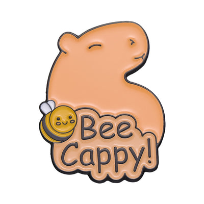 Cute capybara enamel brooch wearing a pink donut with sprinkles and "DONUT WORRY BE CAPPY" text. - Image 31
