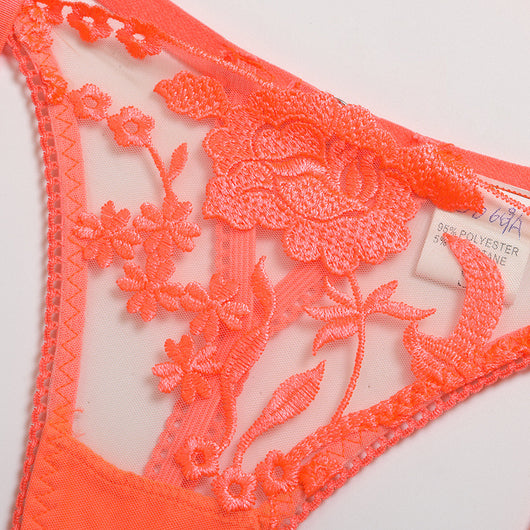 Purple embroidered lace three-piece lingerie set with underwire bra, thong, and garter belt on a white surface. - Image 17