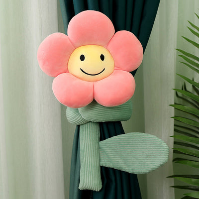 Plush white sunflower curtain buckle with a yellow smiley face center and green stem, holding back a dark green curtain. - Image 18