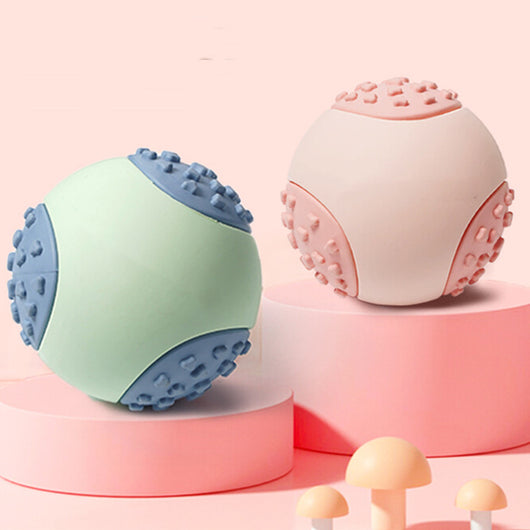 Mint green and blue rubber dog toy ball with textured nubs, measuring 64mm, for vocal and bite-resistant play. - Image 12