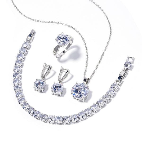Four-piece jewelry set with silver-toned metal and round deep pink gemstones, including a necklace, bracelet, ring, and earrings. - Image 6