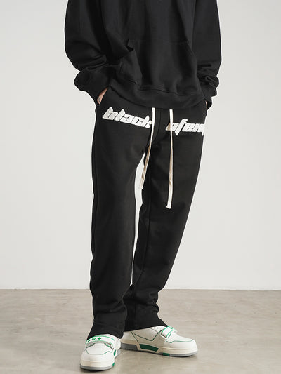 Pantalones de Buzo con Aberturas Laterales y Cordón Ajustable - Image 9