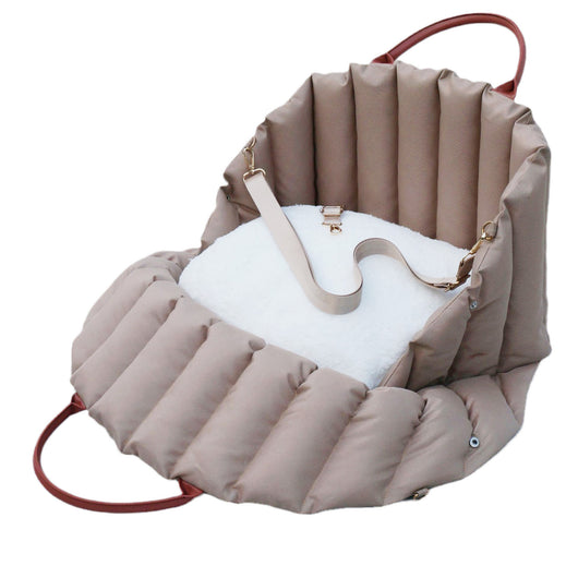 Light khaki quilted portable pet carrier with brown handles and a cream shoulder strap for car travel. - Image 5