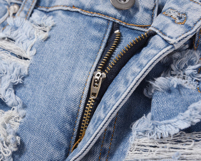 Jeans Vintage Desgastados con Roturas en las Rodillas - Image 6