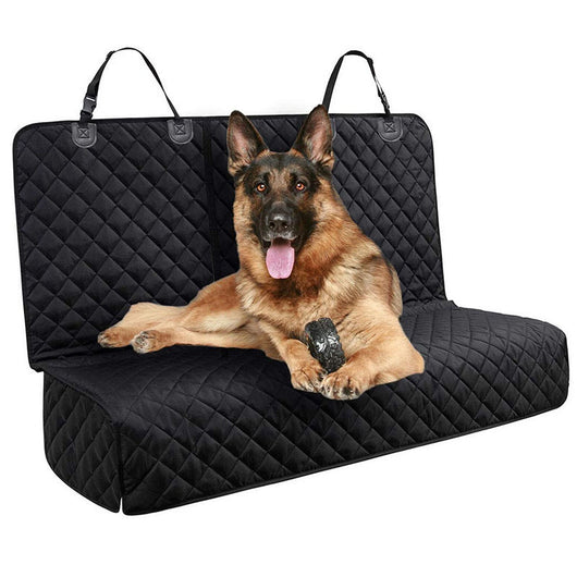 Black quilted car seat cover for dogs, shown with a golden retriever, protecting the rear seat from water and dirt. - Image 18