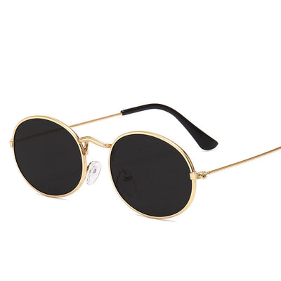 Retro round frame sunglasses with gold metal frames, black lenses, and black temple tips on a white background. - Image 10