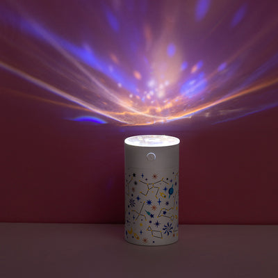 Dark green cylindrical humidifier with a clear top, featuring a colorful celestial pattern of stars, planets, and constellations. - Image 3