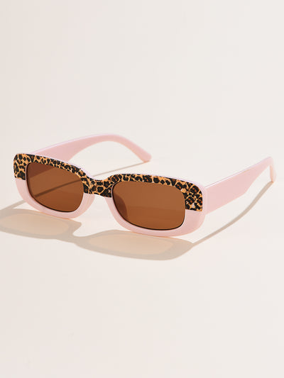 Rectangular tortoiseshell sunglasses with a small frame and dark gray lenses, angled on a white background. - Image 42
