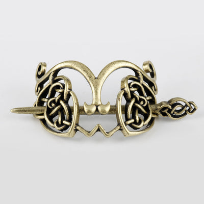 Silver metal hair clip with a retro dragon head and infinity knot design, secured by a plug-in hairpin. - Image 15