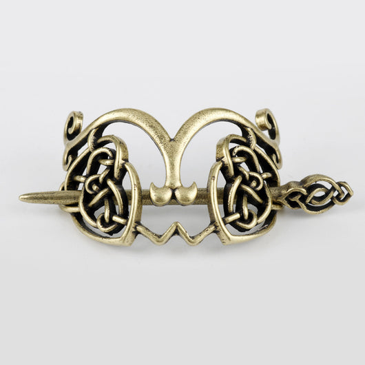 Silver metal hair clip with a retro dragon head and infinity knot design, secured by a plug-in hairpin. - Image 15
