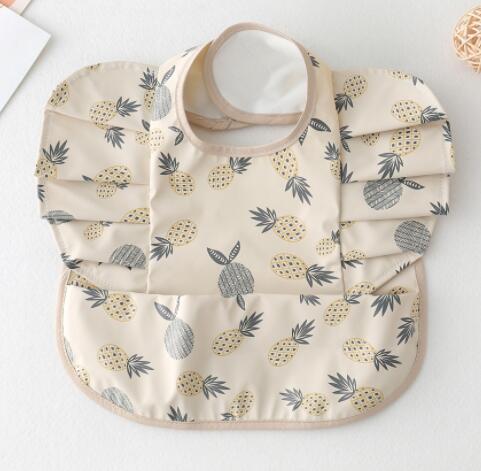 Babero Impermeable con Bolsillo Alas de Ángel para Bebé - Image 32