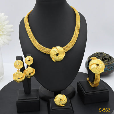 Gold-colored four-piece jewelry set with mesh texture: necklace, drop earrings, bracelet, and ring, all with knot design. - Image 9