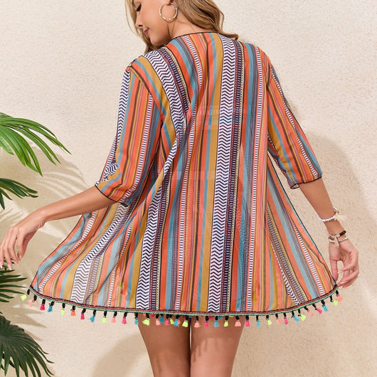 Four-piece swimsuit set with a colorful striped bikini, tassel shorts, and a matching kimono cover-up. - Image 4