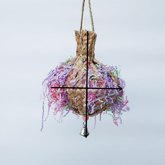 Woven straw paper parrot toy filled with colorful shredded paper, featuring a small bell at the bottom. - Image 2