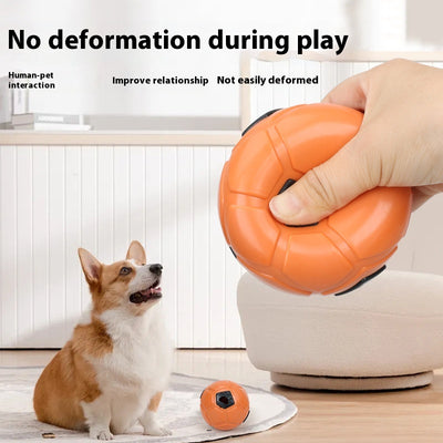 White and black dog toy with a soccer ball base and a textured rod for nibbling and teeth grinding. - Image 4