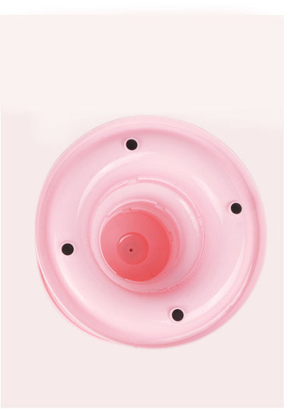 Brown tabby cat sniffing a black and orange multi-level rotating cat plate toy with colorful balls and bunny ears. - Image 12