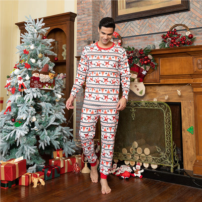 White baby romper with red and black Fair Isle pattern, Santa Claus, and Christmas trees, long sleeves, round neck. - Image 2