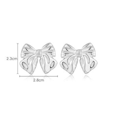 Aretes de Moño Estilo Europeo y Americano con Baño de Cobre 18K - Image 6