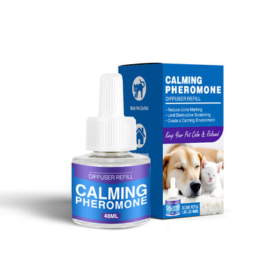 Cat Calming Pheromone Diffuser Kit with a white plug-in diffuser and a green refill bottle, next to its green and white box. - Image 21