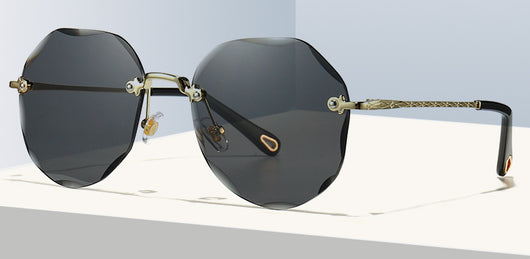 Gafas de Sol Poligonales para Mujer sin Montura con Detalles Metálicos - Image 17