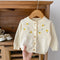 Cardigan Hueco con Flores Bordadas y Protección Solar