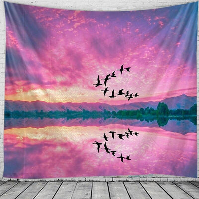 Rectangular tapestry with a vibrant pink and purple sunset sky, silhouetted birds flying, and a reflective lake with distant mountains. - Image 2