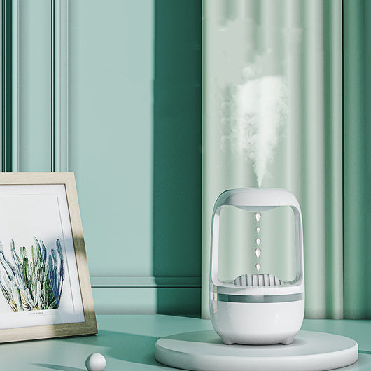 White anti-gravity water drop humidifier with a unique open-frame design and ribbed top, ideal for modern spaces. - Image 7