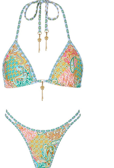 Halterneck two-piece swimsuit with a vibrant paisley print in blue, green, orange, and pink, featuring light blue straps. - Image 11