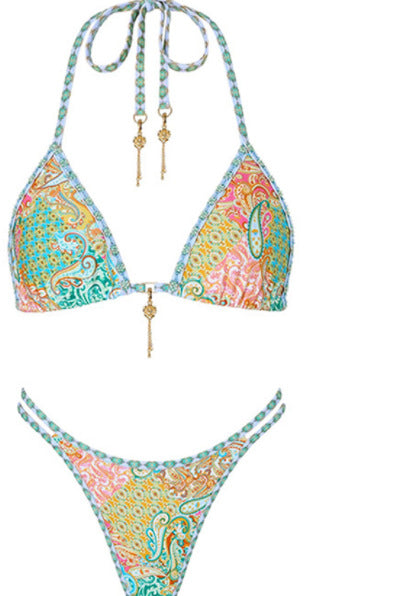 Halterneck two-piece swimsuit with a vibrant paisley print in blue, green, orange, and pink, featuring light blue straps. - Image 11