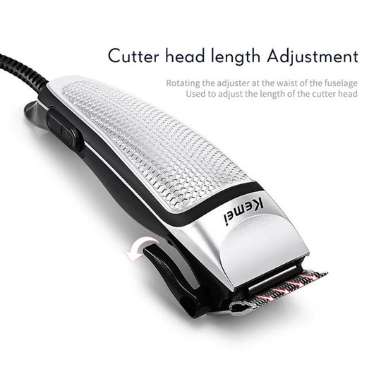 Kemei electric hair clipper kit with silver and black trimmer, four guide combs, scissors, comb, and cleaning brush. - Image 10