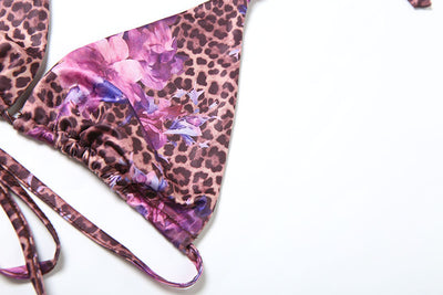 Three-piece bikini set with a brown leopard and pink floral print halter top, matching bottom, and ruched mini skirt. - Image 18